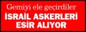 İsrail askerleri esir alıyor